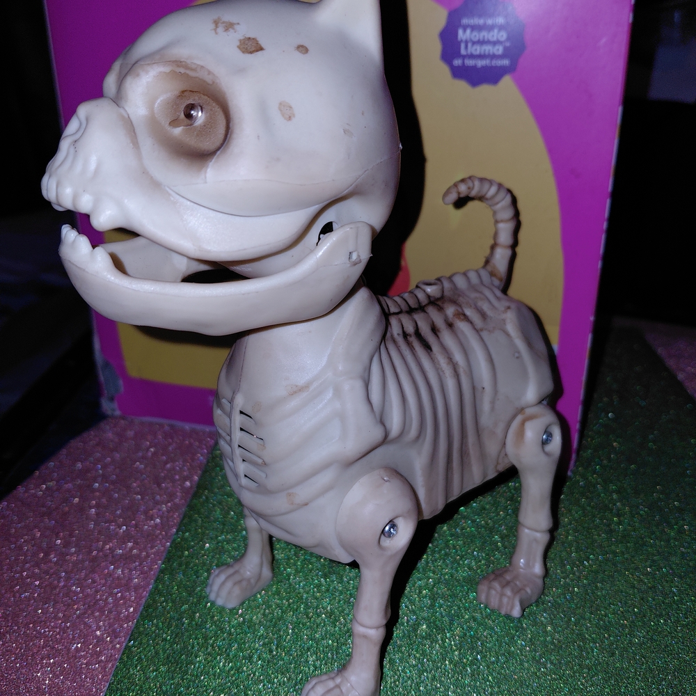 Whimsical Cream Skeleton Dog Figurine Motion,Lights, & Sound Pan Asian vintage